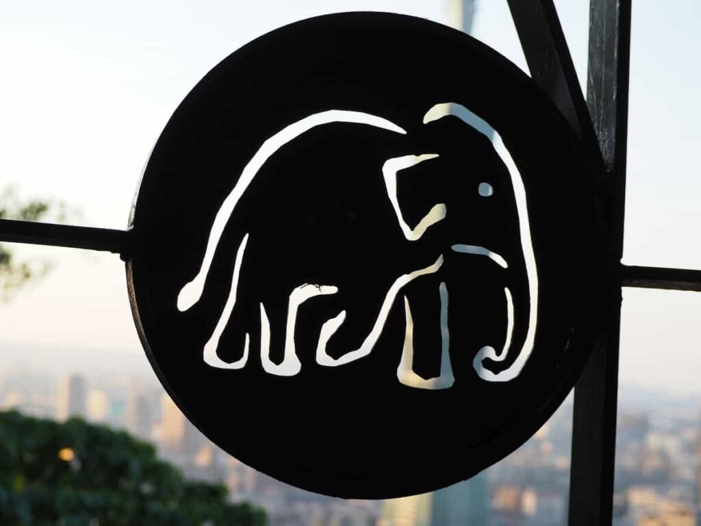 Elephant Mountain sign is a black circle with an elephant outline cut out in the centre.